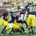 Michigan defense puts a stop to Central Michigan ball runner halfback Zurlon Tipton during the first half at Michigan Stadium on Saturday, August 31, 2013. Melanie Maxwell | AnnArbor.com